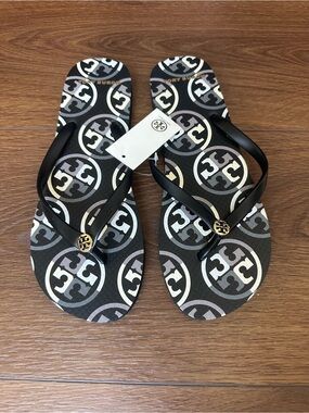 Tory Burch Black Logo Pattern Flip Flop Sandals with Gold Accents